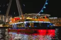 Experience unparalleled luxury with Xclusive Yachts - enjoy a 90-minute 5-star dinner cruise in Dubai Marina, featuring a delectable international buffet from The Radisson Blu Hotel, live cooking stations, and enchanting live music, all aboard our 125ft g